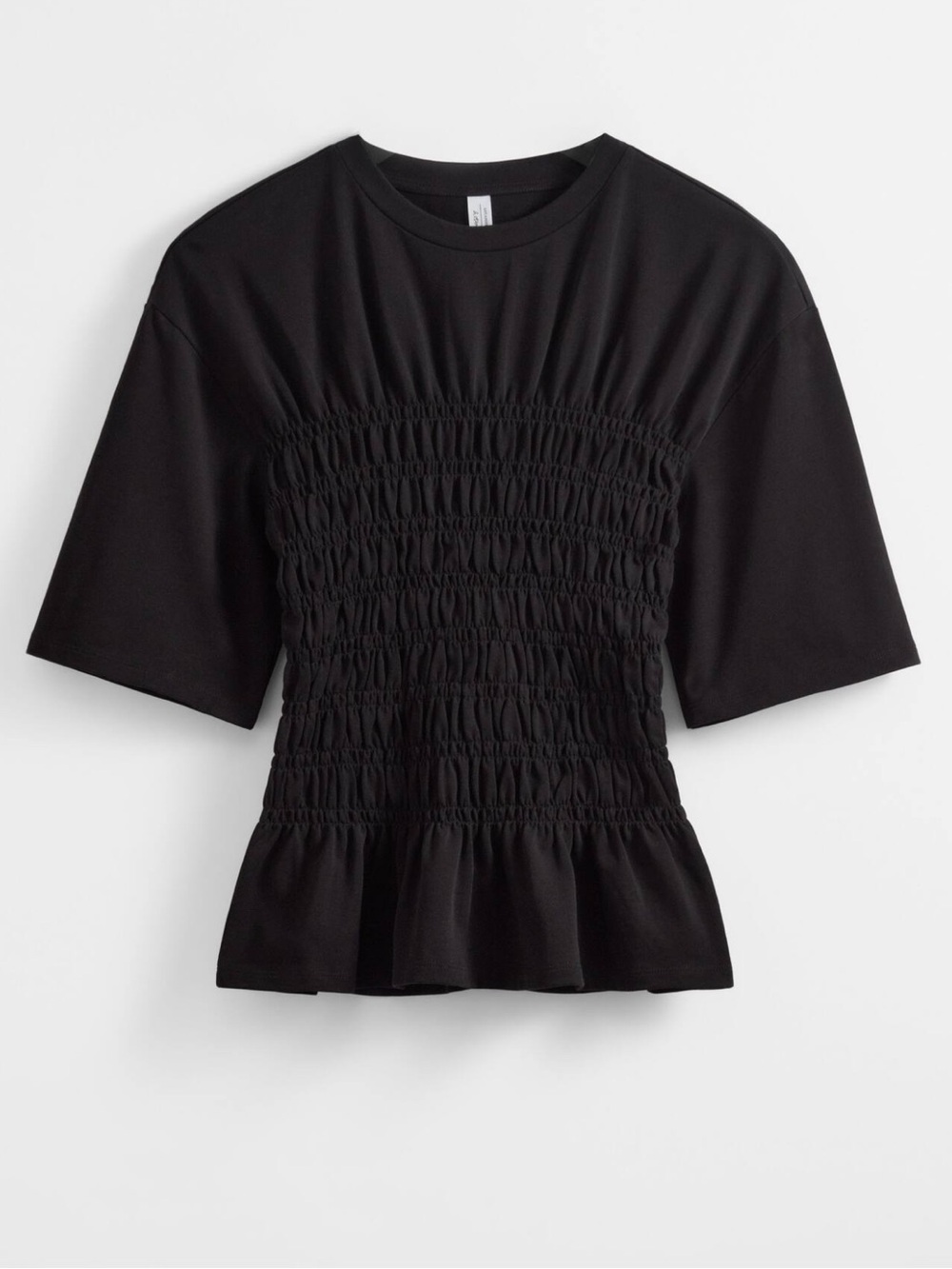 Black Smocked T-Shirt, featuring a fitted smocked bodice and a playful hem